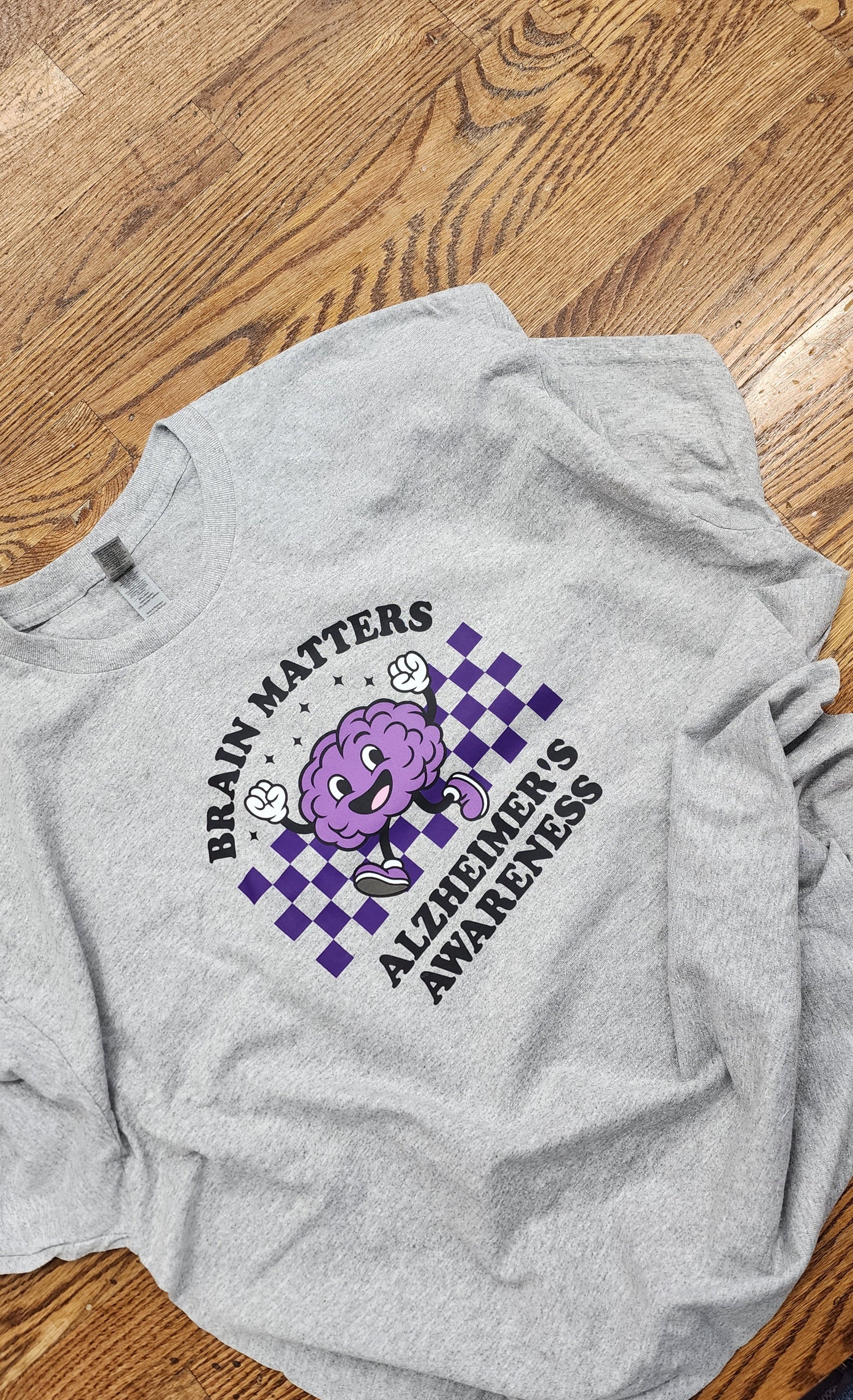 Gray T-shirt with Alzheimer's awareness design 