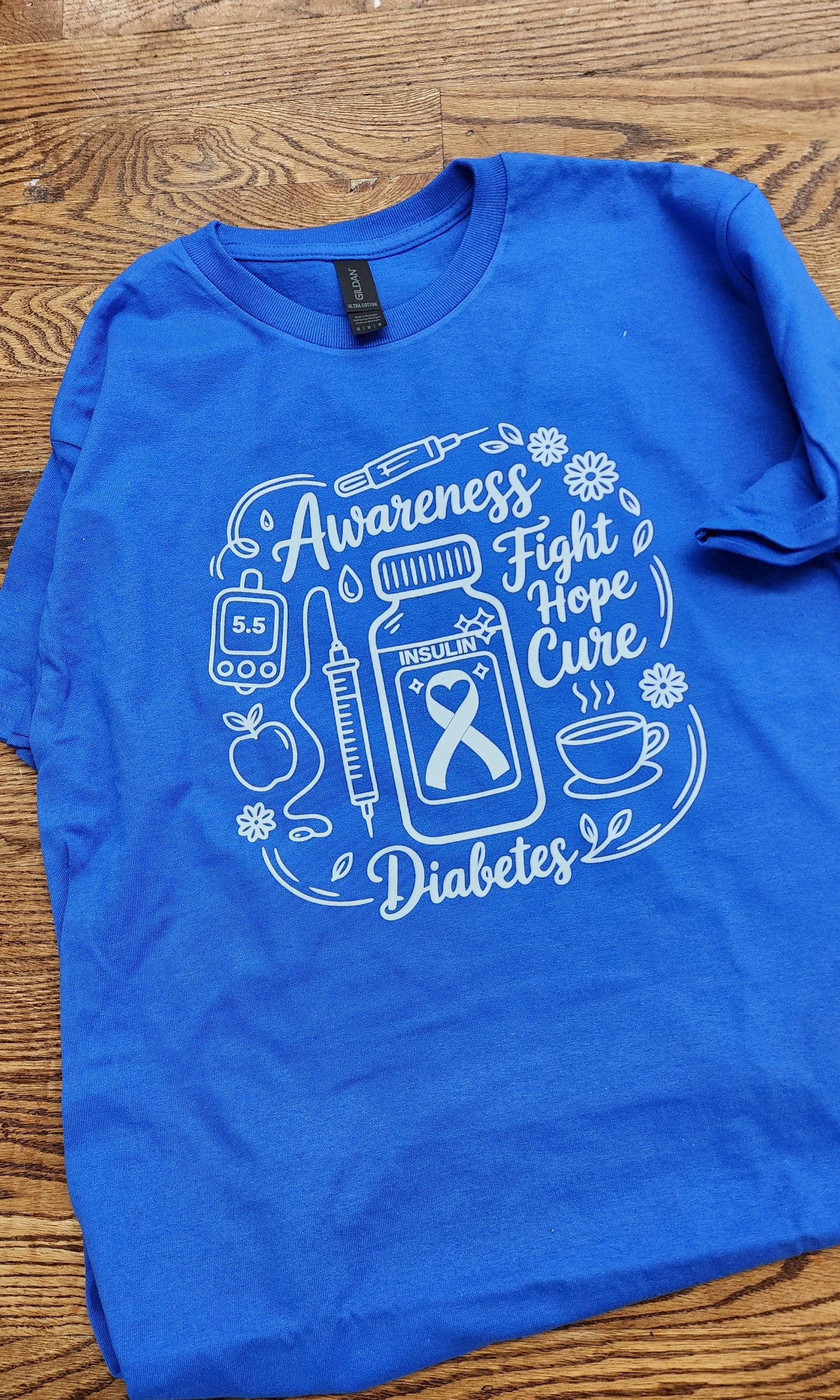 Blue t-shirt with diabetes awareness design 