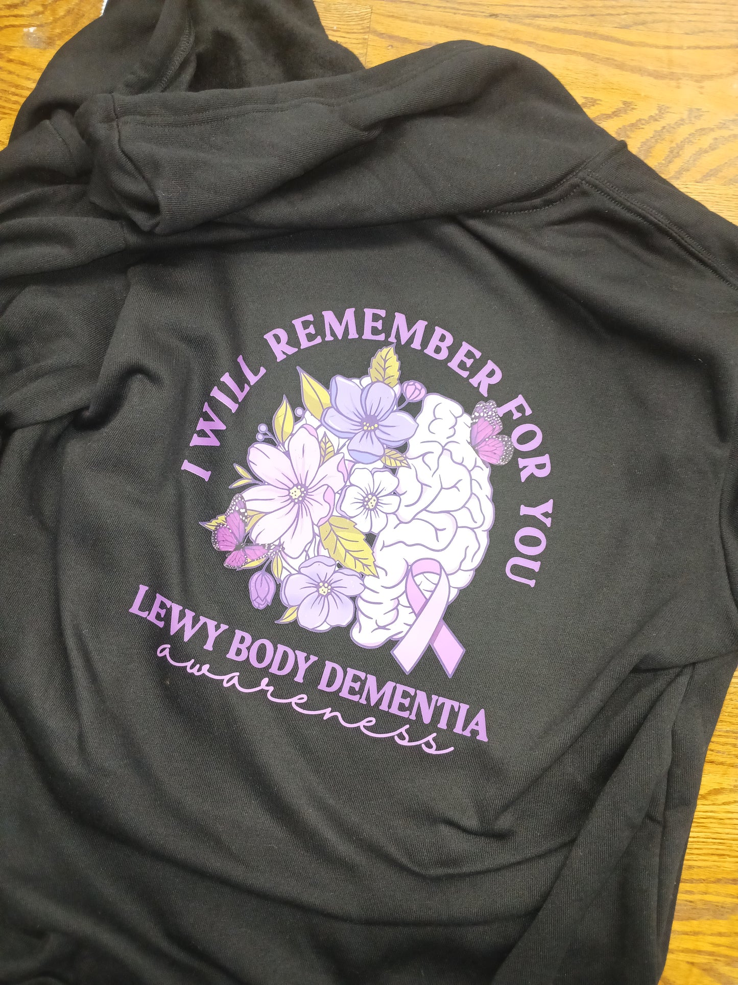Black sweatshirt with floral design and text I will remember for you